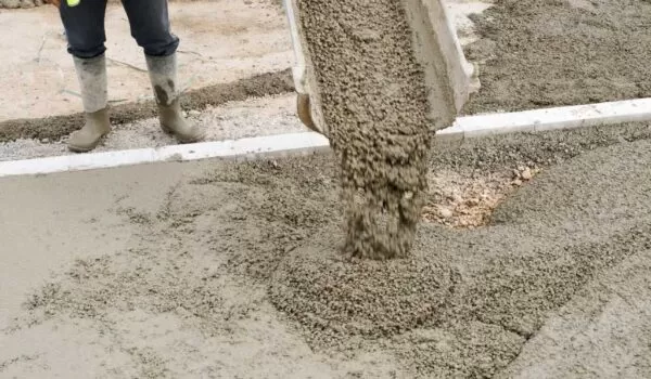 concrete being poured out of a cement truck | EasyMix Concrete 